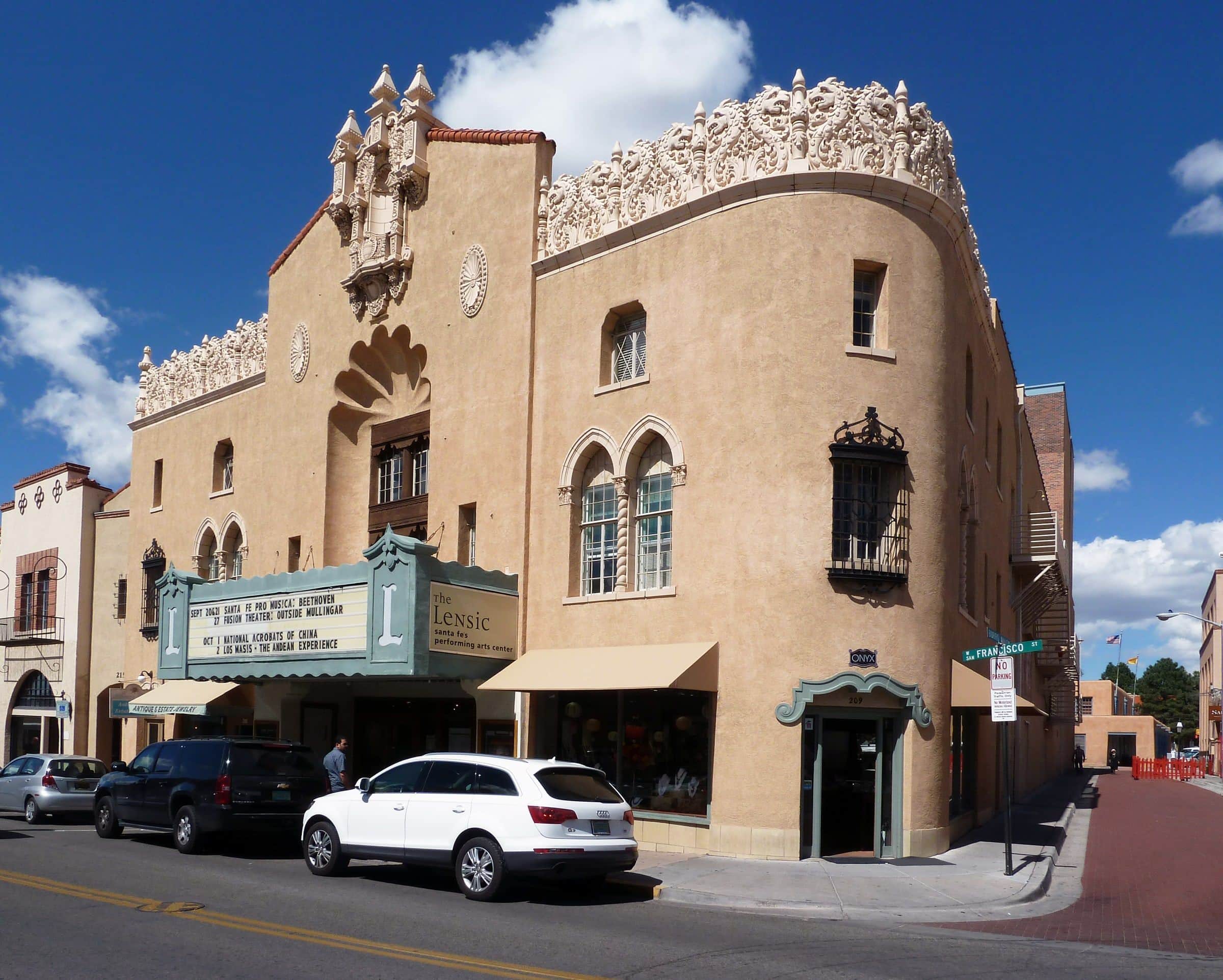 The Lensic Performing Arts Center on San Francisco Street, its marquee and carved towers
